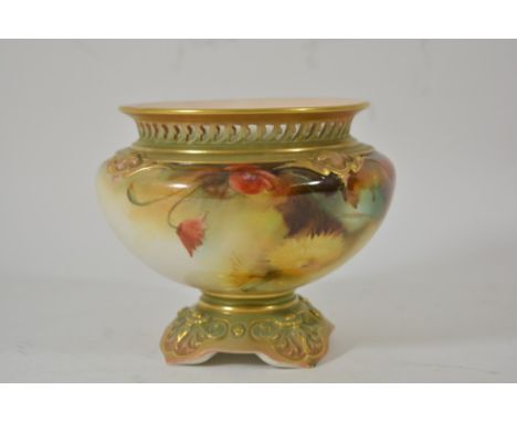 A Royal Worcester Hadley ware vase decorated with flowers and foliage