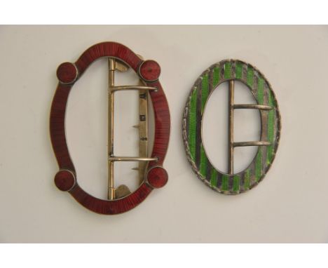 Two silver and enamel brooches of oval form, Birmingham 1903 and London 1899.