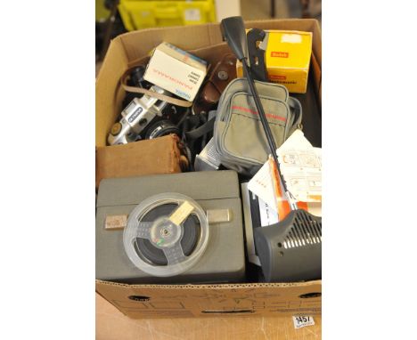 A box containing cameras, a cinecamera and a projector