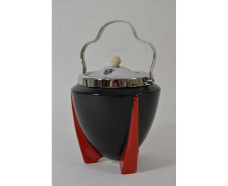 Another Art Deco Wilkinson 'Yoo Hoo' pattern biscuit barrel having black body on red fin shaped feet with chrome lid and hand