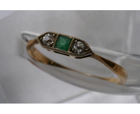 An 18ct gold, 1920s emerald and diamond ring