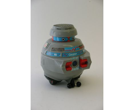 A boxed vintage George, the computer robot with original instruction manual.