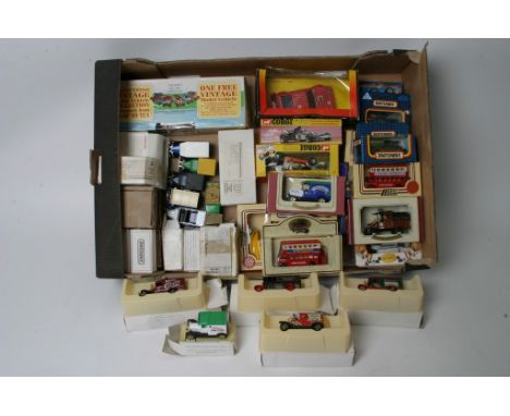 A collection of boxed die cast vehicles including Corgi, Matchbox and Lledo.