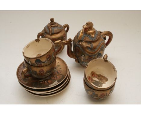 A late 19th Century Japanese Satsuma ware coffee service (7 piece).