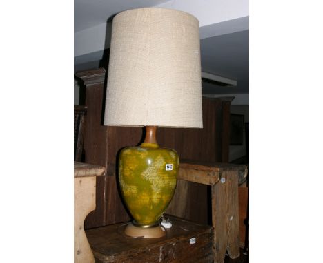 A modern design table lamp of inverted baluster form and with a mottled green finish.