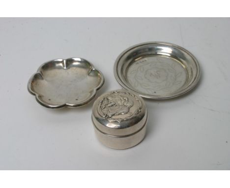 A Chinese white metal petal shaped dish plus another dish and trinket box with cherub decoration to lid