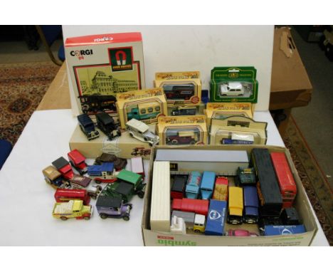A small collection of boxed and unboxed model vehicles including Corgi classics
