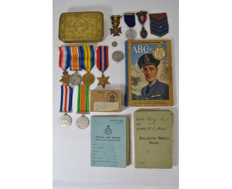 A group of First World War medals and WWII medals to R J Gray A S C with paper work