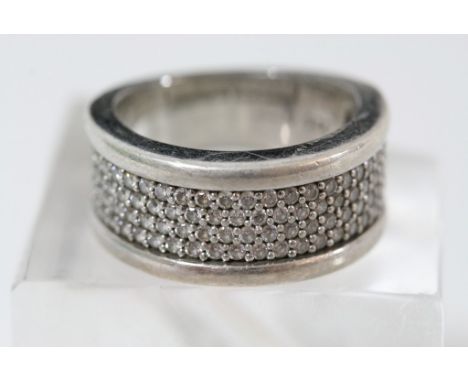 A large silver and diamond ring, approx 1ct total weight