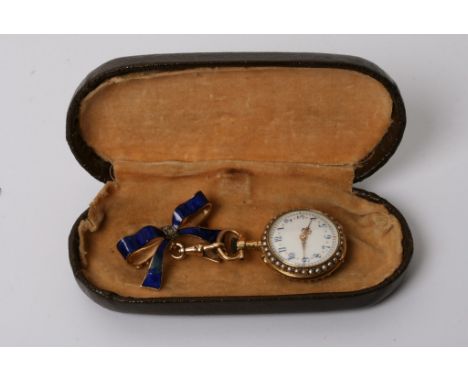 A fine quality gold and enamel lady's fob watch the reverse decorated with diamond set  anchor and rows of seed pearls to dia