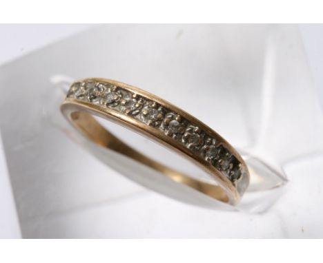 A 9ct gold and diamond half hoop eternity ring