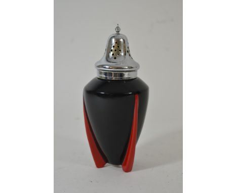 An Art Deco Wilkinson 'Yoo Hoo' pattern sifter having black body on red fin shaped feet with chrome lid and handle, design at