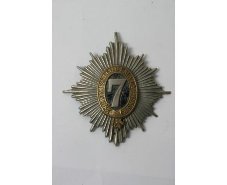 An original helmet plate of the 7th Dragoons, 4 post fitting, the very tip of the bottom star is missing