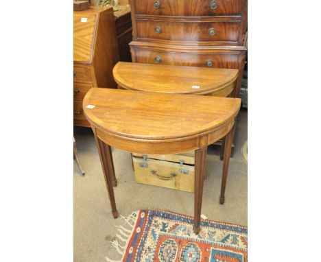 A pair of mahogany, Georgian style card table