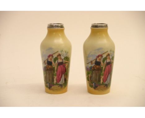 A pair of silver rimmed ceramic vases with transfer printed decoration of field workers on a blush ivory ground. Height 15.5c