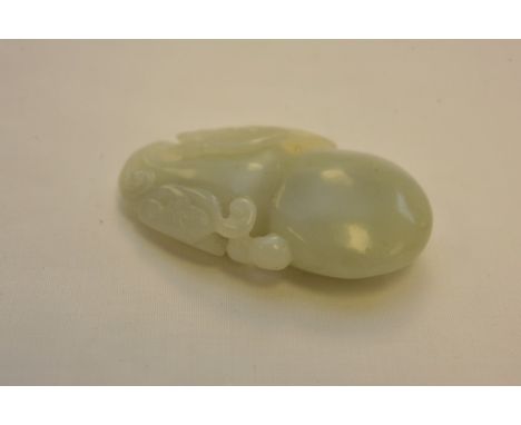 A Chinese jade gourd shaped pendant