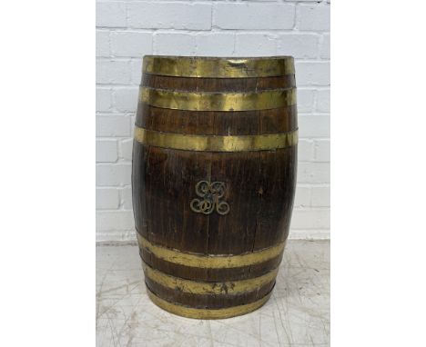 AN ANTIQUE BRASS BOUND STICK STAND WITH ROYAL EMBLEM55cm x 31cm