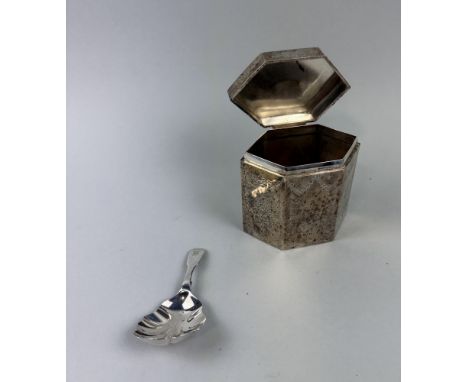 AN ANTIQUE SILVER TEA CADDY WITH SPOON 10 cm HWeight 206 gms