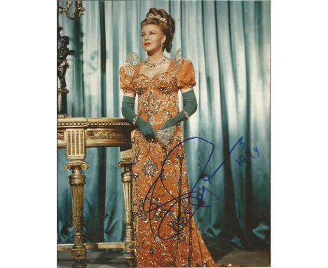 Ginger Rogers signed 10 x 8 colour full length portrait photo in stunning long dress. good condition, R &amp; R auctions COA.