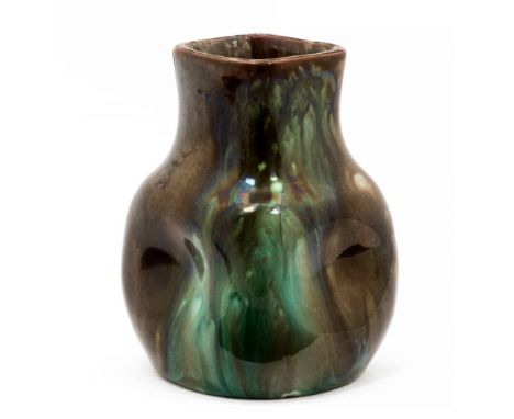 Christopher Dresser for Linthorpe, an Art Pottery miniature vase, square section, dimpled bulbous form with green brown glaze