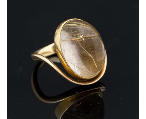 Bent Gabrielsen Pedersen, a Danish Modernist 14 carat gold and rutilated quartz cabouchon ring, marked design number 497, siz