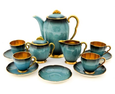 A Carlton Ware Art Deco Bleu Royale coffee set, including coffee pot, four cups, saucers, milk jug and sugar bowl