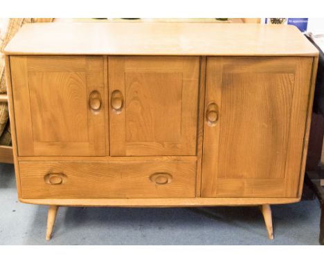 An Ercol light elm and beech sideboard, double doors over a single drawer, on tapered legs, 114cm wide, 83cm high, 48cm deep