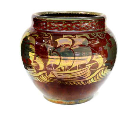 William S Mycock and Edward T Radford for Pilkington, a Royal Lancastrian lustre vase, 1933, ovoid form, red ground with irid