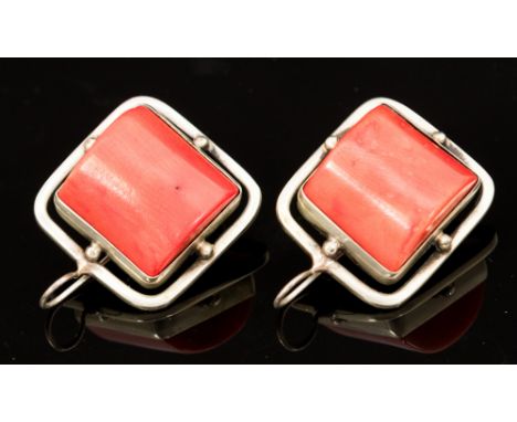 A Modernist silver and coral ring and earring set, circa 1970s, probably Russian, the convex segments set within an open fram