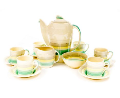 A Susie Cooper coffee set, Kestrel shape in wash banded green, including coffee pot cans, saucers, milk jug and sugar bowl, p