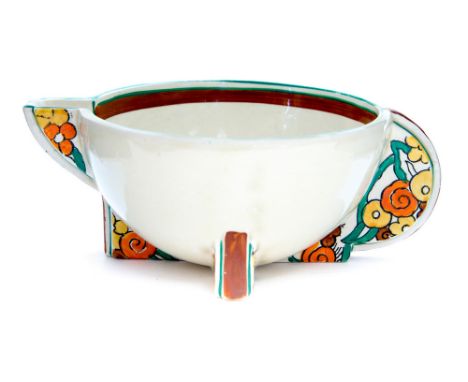 Clarice Cliff for Wilkinson, a Stamford pattern, hemispherical form jug with cross feet, circular handle and spout, Bizarre m