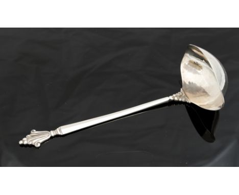 Johan Rohde for Georg Jensen, a Danish silver Acanthus or Dronning pattern sauce ladle, designed 1917, double lipped hammered
