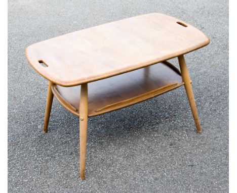 An Ercol light elm and beech coffee table, rectangular shaped top on four tapered legs united by a low shelf, 74cm wide, 44cm