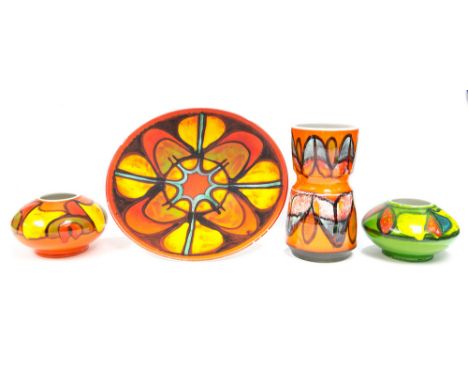 A collection of Poole Pottery Delphis vases and a plate, various patterns and monograms including Anne Godfrey, Ingrid Hammon