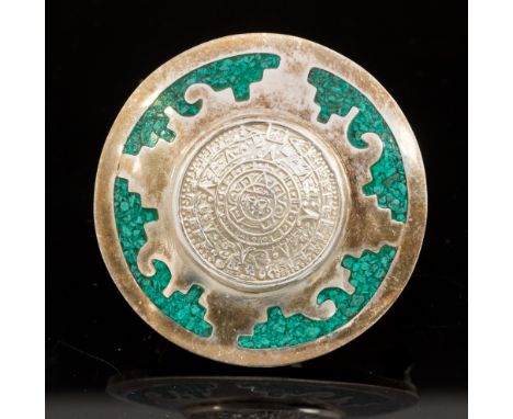 A Mexican silver target brooch, Mayan calendar within a ground turquoise champleve type border, marked TC-105, Mexico, 925, 4