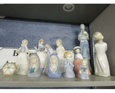 A group of Lladro, Nao, Spanish, German and other porcelain figurines 