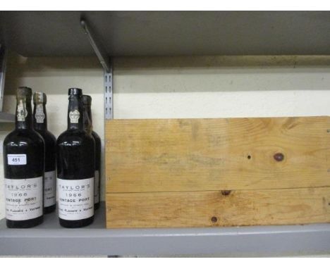 Four bottles of Taylors 1966 vintage port, only partial contents, together with a wooden crate 