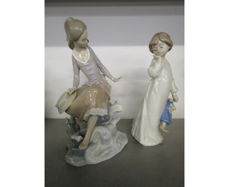 A Lladro figure of a girl resting and a Nao figure of a girl with a teddy 