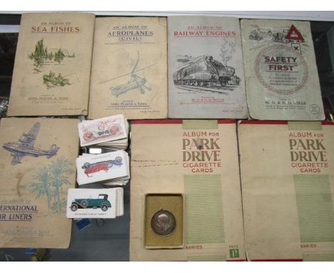 A WW1 BWM named to 1882 Pte WA Roberts South Wales Borders, along with seven albums of cigarette cards including Wills Safety