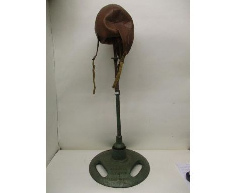 A vintage Achilles Olympyx lightweight brown leather punch bag, on a green painted cast iron stand, 37"h 