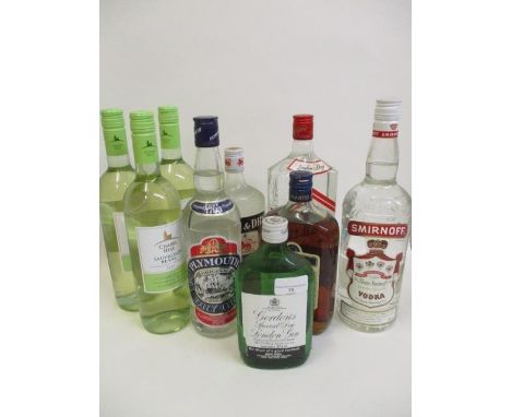 Nine bottles of miscellaneous wine and spirits to include Martell Cognac, 24 fl oz and gin etc 