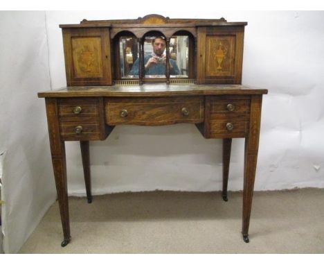 A late Victorian boxwood, string inlaid, rosewood and marquetry writing desk with a shelf over a mirrored back, turned column