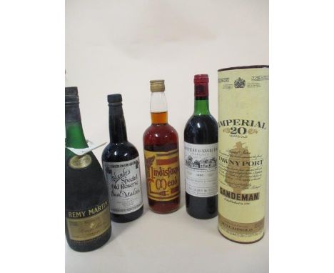 Five bottles to include Remy Martin Cognac and Sandeman Tawny port