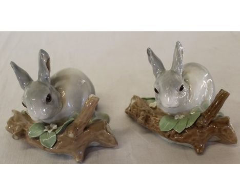 Two Lladro rabbits on naturalistic bases