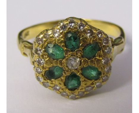 18ct gold six stone emerald and multi set diamond cluster ring size P/Q weight 4.7 g