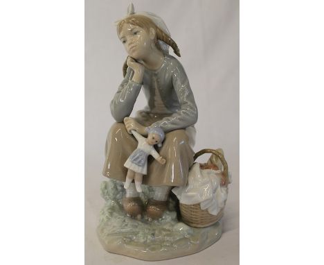 Lladro girl with picnic basket holding doll, height 23cm
