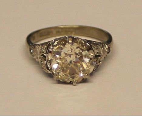 18ct white gold old cut diamond solitaire ring with diamond accents to the shoulders, approximately 2.0ct, K-L colour, hallma