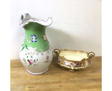 A late 19th early 20thc Moore Bros water pitcher with floral decoration, measures 32cm high, and a footed flower bowl, stampe