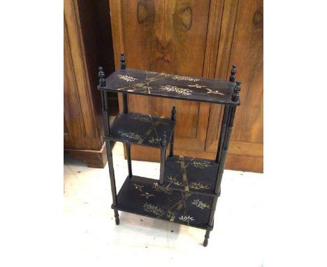 An ebonised Japanese style display shelf with bamboo and bird decoration, measures 76cm x 46cm x 23cm