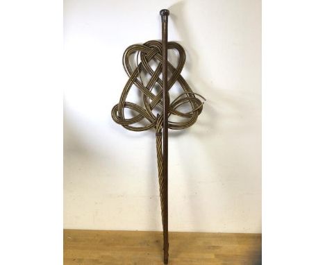 A late 19th early 20thc walking stick with silver knop, measures 88cm, along with a vintage wicker carpet beater (2)